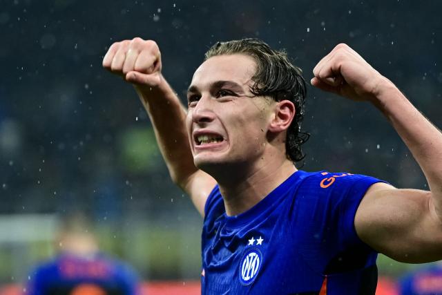 Inter Milan's Italian forward #94 Francesco Pio Esposito celebrates after scoring his team third goal during the Italian Serie A football match between Inter Milan and Pisa at the San Siro Stadium in Milan on January 23, 2026. (Photo by Piero CRUCIATTI / AFP)