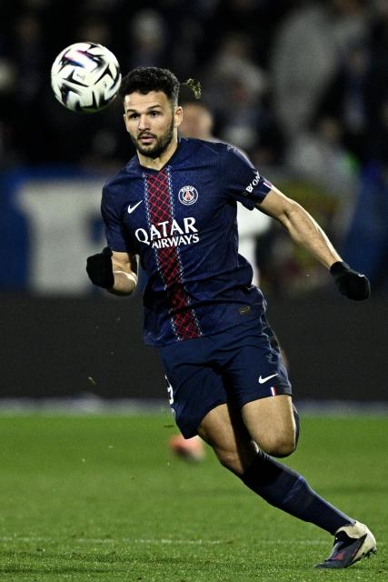 Paris Saint-Germain's Portuguese forward #09 Goncalo Ramos runs with the ball during the French L1 football match between  AJ Auxerre and Paris Saint-Germain (PSG) at Stade de l'Abbe-Deschamps in Auxerre on January 23, 2026. (Photo by JULIEN DE ROSA / AFP)