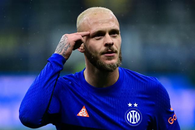 Inter Milan's Italian defender #32 Federico Dimarco  celebrates after scoring his team fourth goal during the Italian Serie A  football match between Inter Milan and Pisa at the San Siro Stadium in Milan on January 23, 2026. (Photo by Piero CRUCIATTI / AFP)