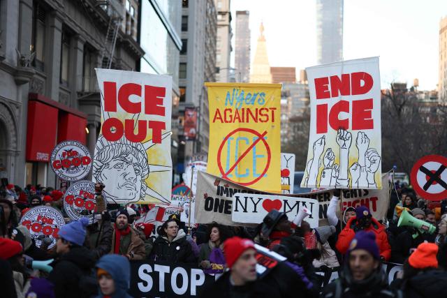 People hold signs and march during an "ICE Out" protest in New York on January 23, 2026 against US Immigration and Customs Enforcement (ICE). Demonstrations against ICE grew dramatically following the killing of Renee Nicole Good, 37, by an ICE officer in Minneapolis on January 7 as the Trump administration pressed operations to catch undocumented migrants. (Photo by ANGELA WEISS / AFP)