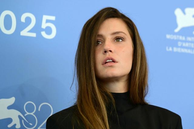 (FILES) French actress Adele Exarchopoulos attends the photocall of  "Chien 51" the closing movie of the 82nd International Venice Film Festival, at Venice Lido on September 6, 2025. Rapper Doums has been taken into custody in Paris following a complaint by his ex-partner, actress Adele Exarchopoulos, who accuses him of domestic violence between 2017 and 2024, according to sources speaking to AFP on January 23, 2026. (Photo by Tiziana FABI / AFP)