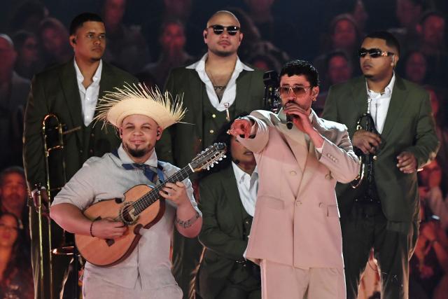 Puerto Rican rapper Bad Bunny (R) performs during his "Debi tirar mas fotos" world tour at the Atanasio Girardot Stadium in Medellin, Colombia, on January 23, 2026. (Photo by Jaime SALDARRIAGA / AFP)