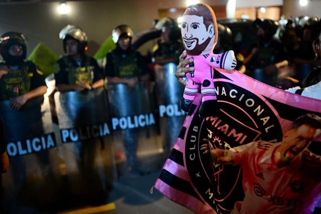 A doll depicting Inter Miami's Argentine player Lionel Messi is pictured while fans await the team's arrival outside the Hotel Intercontinental in Lima on January 23, 2025, on the eve of the friendly football match against Alianza Lima. (Photo by ERNESTO BENAVIDES / AFP)
