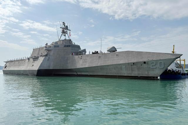 The US Navy's USS Cincinnati (LCS-20) littoral combat ship arrives for a port call at the Ream Naval base, located in Cambodia's southern coast in Preah Sihanouk province, on January 24, 2026. (Photo by Suy SE / AFP)