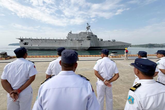 Royal Cambodian Navy personnel stand in formation as they welcome the US Navy's USS Cincinnati (LCS-20) littoral combat ship for a port call at the Ream Naval base, located in Cambodia's southern coast in Preah Sihanouk province, on January 24, 2026. (Photo by Suy SE / AFP)