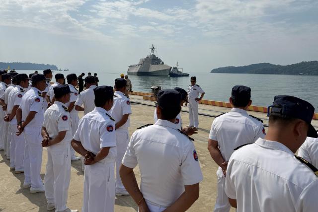 Royal Cambodian Navy personnel stand in formation as they welcome the US Navy's USS Cincinnati (LCS-20) littoral combat ship for a port call at the Ream Naval base, located in Cambodia's southern coast in Preah Sihanouk province, on January 24, 2026. (Photo by Suy SE / AFP)