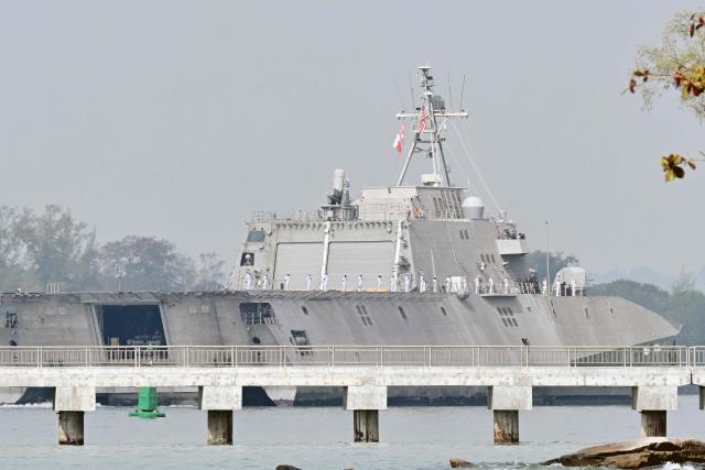 The US Navy's USS Cincinnati (LCS-20) littoral combat ship arrives for a port call at the Ream Naval base, located in Cambodia's southern coast in Preah Sihanouk province, on January 24, 2026. (Photo by TANG CHHIN Sothy / AFP)