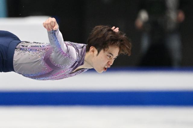 Japan’s Kazuki Tomono competes in the men’s short program at the ISU Four Continents Figure Skating Championships in Beijing on January 24, 2026. (Photo by GREG BAKER / AFP)