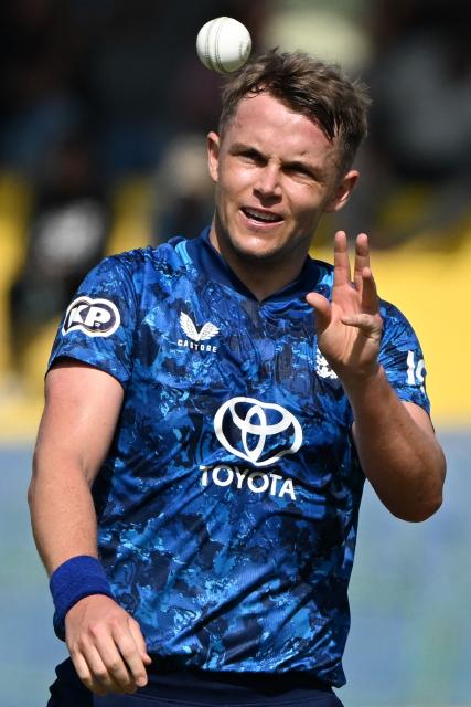 England's Sam Curran prepares to bowl during the second one-day international (ODI) cricket match between Sri Lanka and England at the R. Premadasa International Cricket Stadium in Colombo on January 24, 2026. (Photo by Ishara S. KODIKARA / AFP)