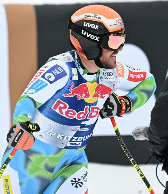 Slovenia's Miha Hrobat reacts in the finish area during the Men's Downhill event of the FIS Alpine Skiing World Cup in Kitzbuhel, Austria, on January 24, 2026. (Photo by BARBARA GINDL / APA / AFP) / Austria OUT