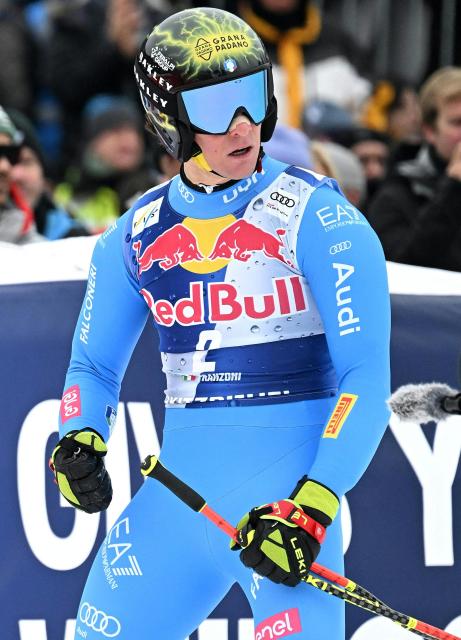 Italy's Giovanni Franzoni reacts in the finish area during the Men's Downhill event of the FIS Alpine Skiing World Cup in Kitzbuhel, Austria, on January 24, 2026. (Photo by BARBARA GINDL / APA / AFP) / Austria OUT