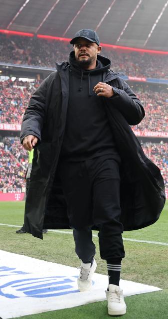 Bayern Munich's Belgian head coach Vincent Kompany arrives for the German first division Bundesliga football match between FC Bayern Munich and FC Augsburg in Munich, southern Germany, on January 24, 2026. (Photo by Alexandra BEIER / AFP) / DFL REGULATIONS PROHIBIT ANY USE OF PHOTOGRAPHS AS IMAGE SEQUENCES AND/OR QUASI-VIDEO