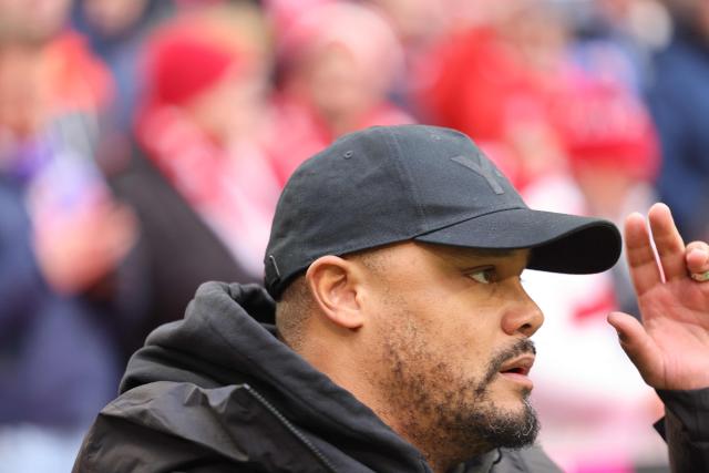 Bayern Munich's Belgian head coach Vincent Kompany raects prior to the German first division Bundesliga football match between FC Bayern Munich and FC Augsburg in Munich, southern Germany, on January 24, 2026. (Photo by Alexandra BEIER / AFP) / DFL REGULATIONS PROHIBIT ANY USE OF PHOTOGRAPHS AS IMAGE SEQUENCES AND/OR QUASI-VIDEO