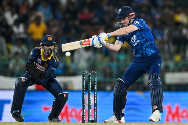 England's captain Harry Brook (R) plays a shot during the second one-day international (ODI) cricket match between Sri Lanka and England at the R. Premadasa International Cricket Stadium in Colombo on January 24, 2026. (Photo by Ishara S. KODIKARA / AFP)