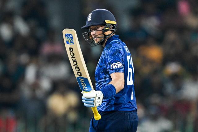 England's Joe Root celebrates after scoring a half-century (50 runs) during the second one-day international (ODI) cricket match between Sri Lanka and England at the R. Premadasa International Cricket Stadium in Colombo on January 24, 2026. (Photo by Ishara S. KODIKARA / AFP)