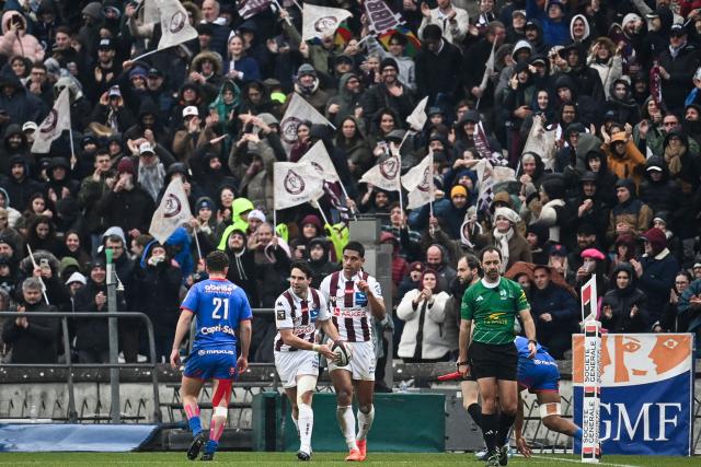 Bordeaux-Begles' New-Zealand wing Salesi Rayasi (C) celebrates after scoring a try during the French Top14 rugby union match between Union Bordeaux-Begles (UBB) and Stade Francais Paris at the Chaban-Delmas Stadium in Bordeaux, south-western France on January 24, 2026. (Photo by Christophe ARCHAMBAULT / AFP)