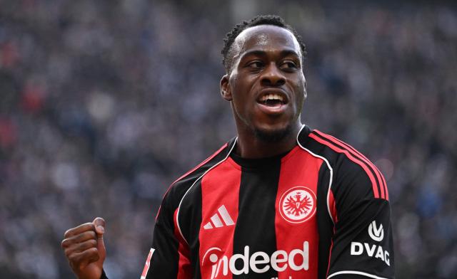 Frankfurt's French forward #25 Arnaud Kalimuendo celebrates his 1-0 during the German first division Bundesliga football match between Eintracht Frankfurt and TSG 1899 Hoffenheim in Frankfurt am Main, western Germany, on January 24, 2026. (Photo by Kirill KUDRYAVTSEV / AFP) / DFL REGULATIONS PROHIBIT ANY USE OF PHOTOGRAPHS AS IMAGE SEQUENCES AND/OR QUASI-VIDEO