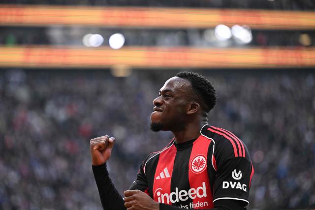 Frankfurt's French forward #25 Arnaud Kalimuendo celebrates his 1-0 during the German first division Bundesliga football match between Eintracht Frankfurt and TSG 1899 Hoffenheim in Frankfurt am Main, western Germany, on January 24, 2026. (Photo by Kirill KUDRYAVTSEV / AFP) / DFL REGULATIONS PROHIBIT ANY USE OF PHOTOGRAPHS AS IMAGE SEQUENCES AND/OR QUASI-VIDEO