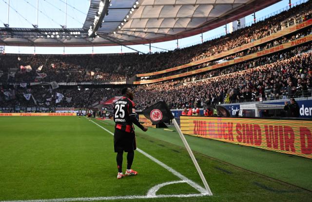 Frankfurt's French forward #25 Arnaud Kalimuendo celebrates his 1-0 during the German first division Bundesliga football match between Eintracht Frankfurt and TSG 1899 Hoffenheim in Frankfurt am Main, western Germany, on January 24, 2026. (Photo by Kirill KUDRYAVTSEV / AFP) / DFL REGULATIONS PROHIBIT ANY USE OF PHOTOGRAPHS AS IMAGE SEQUENCES AND/OR QUASI-VIDEO