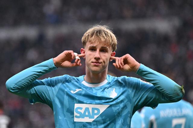 Hoffenheim's German forward #33 Max Moerstedt celebrates his 1-1 during the German first division Bundesliga football match between Eintracht Frankfurt and TSG 1899 Hoffenheim in Frankfurt am Main, western Germany, on January 24, 2026. (Photo by Kirill KUDRYAVTSEV / AFP) / DFL REGULATIONS PROHIBIT ANY USE OF PHOTOGRAPHS AS IMAGE SEQUENCES AND/OR QUASI-VIDEO