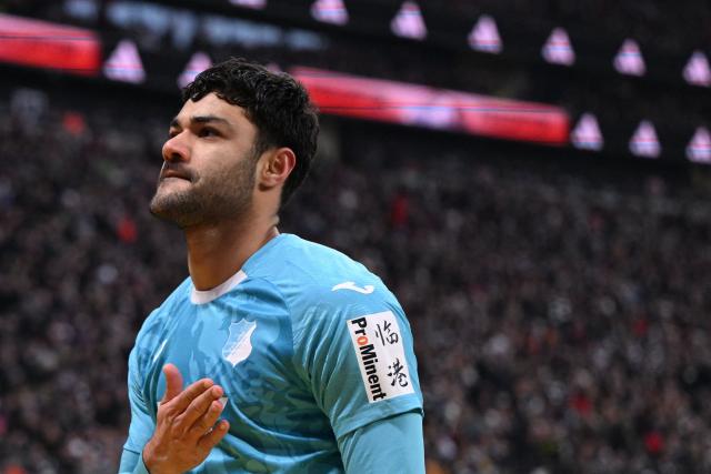 Hoffenheim's Turkish defender #05 Ozan Kabak celebrates his 1-2 during the German first division Bundesliga football match between Eintracht Frankfurt and TSG 1899 Hoffenheim in Frankfurt am Main, western Germany, on January 24, 2026. (Photo by Kirill KUDRYAVTSEV / AFP) / DFL REGULATIONS PROHIBIT ANY USE OF PHOTOGRAPHS AS IMAGE SEQUENCES AND/OR QUASI-VIDEO