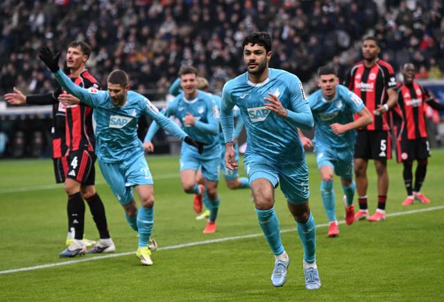 Hoffenheim's Turkish defender #05 Ozan Kabak celebrates his 1-2 during the German first division Bundesliga football match between Eintracht Frankfurt and TSG 1899 Hoffenheim in Frankfurt am Main, western Germany, on January 24, 2026. (Photo by Kirill KUDRYAVTSEV / AFP) / DFL REGULATIONS PROHIBIT ANY USE OF PHOTOGRAPHS AS IMAGE SEQUENCES AND/OR QUASI-VIDEO