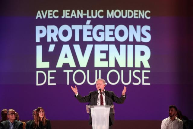 Toulouse's Mayor Jean-Luc Moudenc gestures as he speaks on stage during a campaign rally for re-election in the forthcoming municipal elections under the Protegeons l'avenir list, in Toulouse, on January 24, 2026. (Photo by Valentine CHAPUIS / AFP)