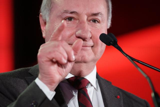 Toulouse's Mayor Jean-Luc Moudenc gestures as he speaks on stage during a campaign rally for re-election in the forthcoming municipal elections under the Protegeons l'avenir list, in Toulouse, on January 24, 2026. (Photo by Valentine CHAPUIS / AFP)