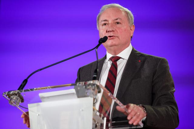 Toulouse's Mayor Jean-Luc Moudenc speaks on stage during a campaign rally for re-election in the forthcoming municipal elections under the Protegeons l'avenir list, in Toulouse, on January 24, 2026. (Photo by Valentine CHAPUIS / AFP)