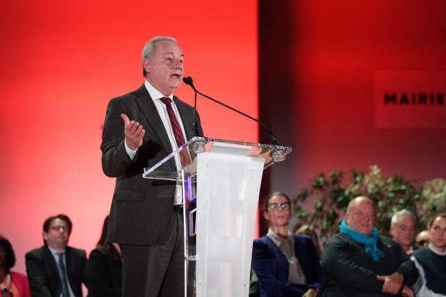 Toulouse's Mayor Jean-Luc Moudenc gestures as he speaks on stage during a campaign rally for re-election in the forthcoming municipal elections under the Protegeons l'avenir list, in Toulouse, on January 24, 2026. (Photo by Valentine CHAPUIS / AFP)