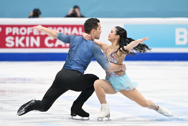 US' Audrey Shin (R) and Balazs Nagy compete in the pairs free skating at the ISU Four Continents Figure Skating Championships in Beijing on January 24, 2026. (Photo by GREG BAKER / AFP)