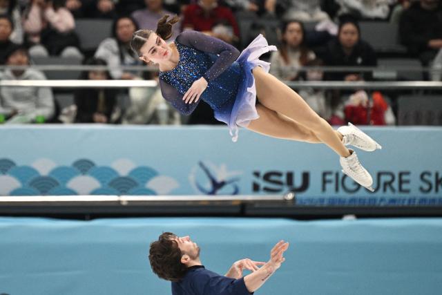 Canada’s Kelly Ann Laurin (top) and Loucas Ethier compete in the pairs free skating at the ISU Four Continents Figure Skating Championships in Beijing on January 24, 2026. (Photo by GREG BAKER / AFP)