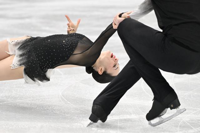 US' Katie McBeath (L) and Daniil Parkman compete in the pairs free skating at the ISU Four Continents Figure Skating Championships in Beijing on January 24, 2026. (Photo by GREG BAKER / AFP)