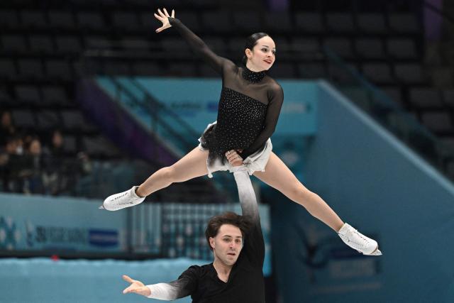 US' Katie McBeath (top) and Daniil Parkman compete in the pairs free skating at the ISU Four Continents Figure Skating Championships in Beijing on January 24, 2026. (Photo by GREG BAKER / AFP)