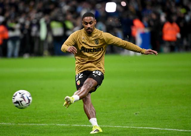 Lens' French forward #22 Wesley Said warms up ahead of the French L1 football match between Olympique de Marseille (OM) and RC Lens at the Stade Velodrome in Marseille, southern France, on January 24, 2026. (Photo by Miguel MEDINA / AFP)