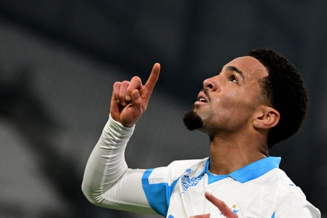 Marseille's English midfielder #11 Ethan Nwaneri celebrates after scoring a goal during the French L1 football match between Olympique de Marseille (OM) and RC Lens at the Stade Velodrome in Marseille, southern France, on January 24, 2026. (Photo by Miguel MEDINA / AFP)