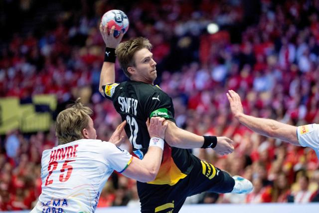 Germany's centre back #22 Marian Michalczik plays the ball during the men's EHF Euro 2026 main round handball match Germany vs Norway in Herning, Denmark, on January 24, 2026. (Photo by Bo Amstrup / Ritzau Scanpix / AFP) / Denmark OUT