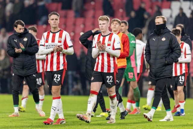 PSV Eindhoven's Dutch midfielder #23 Joey Veerman and PSV Eindhoven's Dutch midfielder #22 Jerdy Schouten applaud to the public at the end of the Dutch Eredivisie football match between PSV Eindhoven and NAC Breda at Philips Stadion in Eindhoven on January 24, 2026. (Photo by Sem van der Wal / ANP / AFP) / Netherlands OUT