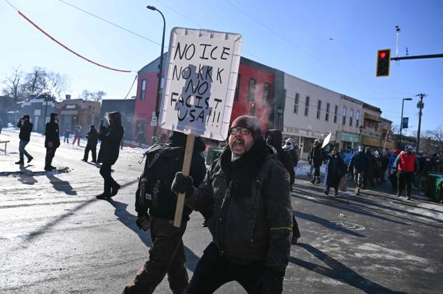 Protesters march near where a man was shot dead by federal immigration agents in Minneapolis, Minnesota, on January 24, 2026. Federal immigration agents shot dead a man in Minneapolis on Saturday, officials said -- the second fatal shooting of a civilian in the city, sparking fresh protests and outrage from state officials. The death came less than three weeks after US citizen Renee Good was shot and killed by an Immigration and Customs Enforcement officer involved in sweeps to round up undocumented migrants. (Photo by ROBERTO SCHMIDT / AFP)