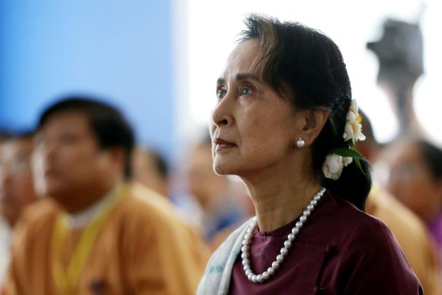 (FILES) Myanmar's State Counsellor Aung San Suu Kyi attends the opening ceremony of the Yangon Innovation Centre in Yangon on July 17, 2019. Myanmar holds the final round of its month-long election on January 25, 2026, with the dominant pro-military party on course for a landslide in a junta-run vote critics say will prolong the army's grip on power. (Photo by Thet AUNG / AFP)