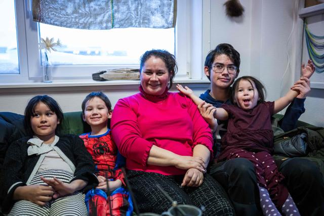Lykke Lynge and her kids are photographed in Nuuk, Greenland, on January 19, 2026. "My children are safe with me": in a café in Nuuk, the capital of Greenland, Lykke looks fondly at her four sons and daughters as they sip hot chocolate, seemingly unaware of the turmoil in the world. (Photo by Jonathan NACKSTRAND / AFP)