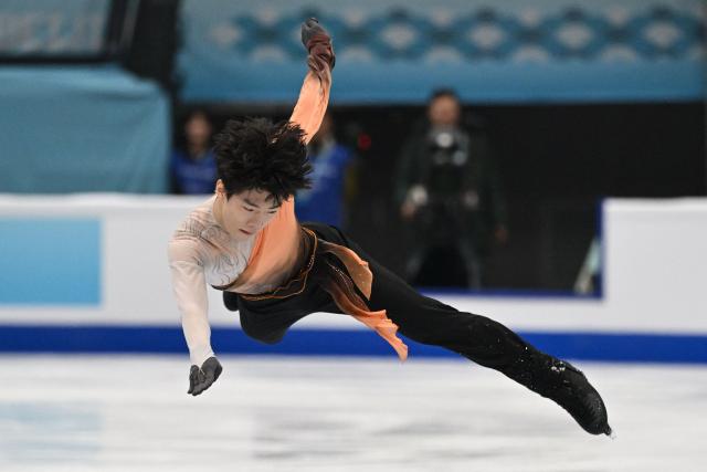 China’s Chen Yudong competes in the men’s free skating at the ISU Four Continents Figure Skating Championships in Beijing on January 25, 2026. (Photo by Greg Baker / AFP)