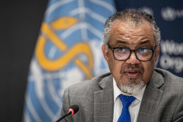 (FILES) WHO Director-General Tedros Adhanom Ghebreyesus looks on during a press conference with the Association of Accredited Correspondents at the United Nations (ACANU) at the World Health Organization's headquarters in Geneva, on December 10, 2024. The World Health Organization chief said on January 24, 2026 that the reasons Washington had given for announcing its withdrawal from the agency were "untrue", warning the departure would make the US and the world "less safe". "Unfortunately, the reasons cited for the US decision to withdraw from WHO are untrue," Tedros Adhanom Ghebreyesus said on X, stressing that the UN health agency had "always engaged with the US, and all Member States, with full respect for their sovereignty". (Photo by Fabrice COFFRINI / AFP)