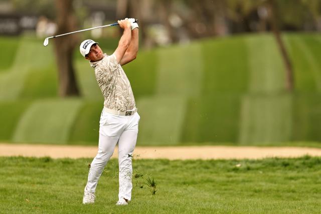 Norway's Viktor Hovland watches after playing a shot on the 2nd hole during the Hero Dubai Desert Classic golf tournament at the Emirates Golf Club in Dubai on January 25, 2026. (Photo by Fadel SENNA / AFP)