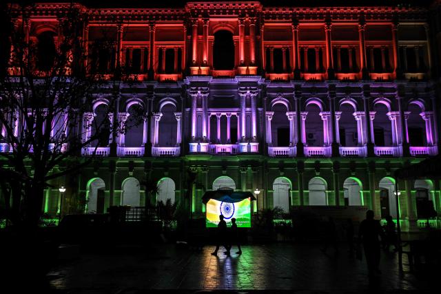 The Ripon Building is seen illuminated with India's national flag colours on the eve of Republic Day celebrations in Chennai on January 25, 2026. (Photo by R.Satish BABU / AFP)