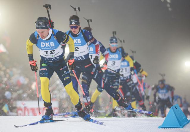 Sweden's Jesper Nelin leads the pack during the men's 15 km mass start competition of the IBU Biathlon World Cup in Nove Mesto, Czech Republic, on January 25,  2026. (Photo by Radek MICA / AFP)