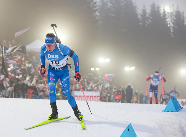 Italy's Lukas Hofer competes in the men's 15 km mass start competition of the IBU Biathlon World Cup in Nove Mesto, Czech Republic, on January 25,  2026. (Photo by Radek MICA / AFP)