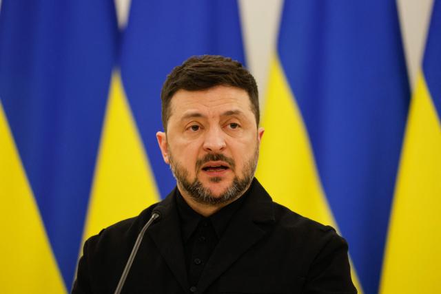 Ukraine's President Volodymyr Zelensky speaks during a joint press conference with Lithuania's President and Poland's President, after attending commemorations of the 1863 uprising, in Vilnius on January 25, 2026. (Photo by Petras Malukas / AFP)