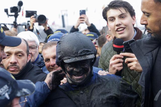 French driver Franck Nivard with Hokkaido Jiel celebrates after winning the 105th Grand Prix d'Amerique harness racing horse race at the Vincennes Hippodrome in Paris on January 25, 2026. (Photo by GEOFFROY VAN DER HASSELT / AFP)