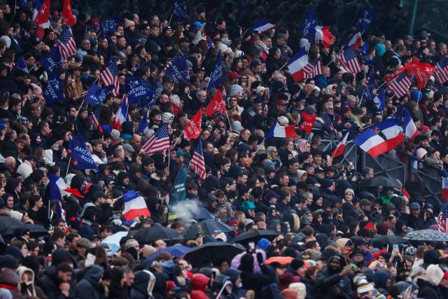 Supporters attend the 105th Grand Prix d'Amerique harness racing horse race at the Vincennes Hippodrome in Paris on January 25, 2026. (Photo by GEOFFROY VAN DER HASSELT / AFP)